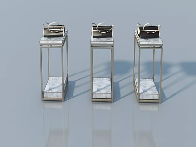 Swing Door Display Stands With Silver Frames And Marble Tops Holding Handbags 3d model