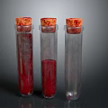 Three Medical Device Test Tubes Containing Red Liquid And Cork Stoppers