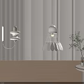 Modern White Pendant Lights With Feather Like Shades And Striped Wall Near Potted Plant