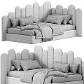Children's Bed With Scalloped Headboard Multiple Pillows And Cozy Patterned Blankets