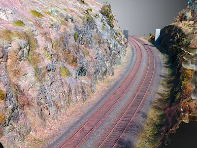 Scenic Train Traveling Through Curved Tracks In Mountainous Rocky Surroundings 3d model