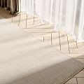Light Beige Woven Square Rug On Wooden Floor With White Curtains And Natural Light