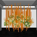 Stunning Indoor Hanging Installation With Orange Vertical Rods And White Green Blooms