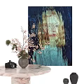 Abstract Painting with Figure in Blue Dark Tones on Marble Table with Vase and Camera