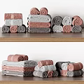 Colorful Laundry Towels Stacked And Rolled On Wooden Shelves For Daily Use