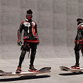 Futuristic Man in Red Black Outfit Standing on Hoverboard Against Gray Wall Background