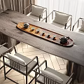 Wooden Tea Table and Chairs with Tea Tray Teapot Cups in Bright Natural Light