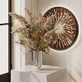 Dried Pampas Grass Arrangement in Transparent Striped Vase on White Tabletop with Circular Decorative Mirror