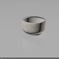 Round Stone Bowl With Textured Beige Surface And Blue Speckles Decorative Functional Container