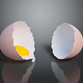 Cracked Egg Halves With Yolk in One and Empty in the Other
