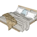 Modern Double Bed With Wooden Frame Gray Quilt Light Brown Blanket And Soft Pillows