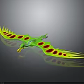 Green And Yellow Eagle Shaped Kite With Red Spotted Wings On Black Background