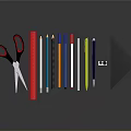 Assorted Stationery Items Including Scissors Colored Pencils Ruler And Pens On Dark Reflective Surface
