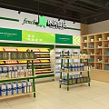 Supermarket Fresh Produce Section with Colorful Fruit Vegetable Shelves and Green Signage