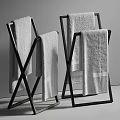 Modern Bathroom Towel Rack With Metal Cross Design And Hanging Black And Gray Towels