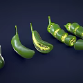 Fresh Green Chili Peppers Whole And Sliced Showing Inner Seeds