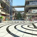 Modern Commercial Street With Pedestrians Shops And Circular Patterned Pavement