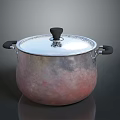 Copper Colored Cooking Pot With Lid And Black Handles For Kitchen Use