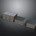 Furniture With Stacked Books In Different Heights Gray Green Covers And Reflective Surface