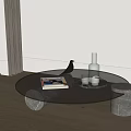 Round Glass Coffee Table with Marble Legs Featuring Magazine Bird Ornament Glass Bottle and Cups