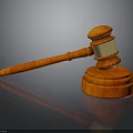 Reddish Wooden Gavel With Golden Band Top And Polished Wooden Base