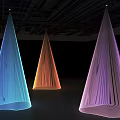 Three Cone Shaped Decorative Lights With Blue Orange Purple Illuminated Pleated Texture