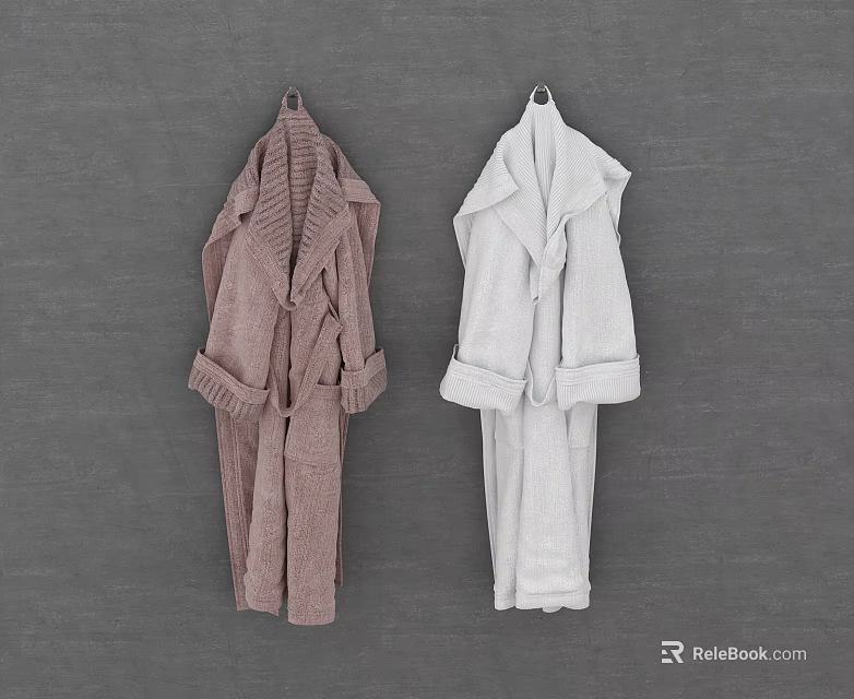 Two Brown And White Robes Hanging On Grey Wall Background 3d model