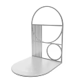 Modern Metal Storage Shelf With Circular And Geometric Design Elements