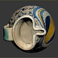 Vintage Ceramic Pitcher With Colorful Blue Yellow Patterns And Decorative Design