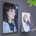 Vertical And Slanted Billboards Showing Female Figures With Headphones Uniform Attire And Green Leaves