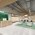 Modern Retail Store Interior With Green Wall Logo Wooden Counter And Product Displays