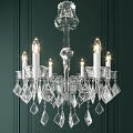 Elegant Crystal Chandelier With Candle Style Bulbs Against Dark Green Wall Background