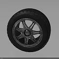 High Quality Car Wheel With Black Tire And Silver Spoke Rim Central Hub Design