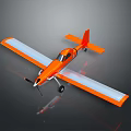 Orange Airplane Model With White And Orange Wings Black Windows On Gray Background With Reflection