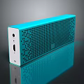 Blue Bluetooth Speaker With Sleek Portable Design Mesh Pattern And LED Lights On Reflective Surface 3d model