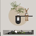 Rabbit Ornament On Black Shelf With Circular Glowing Ring Small Plant And White Wall Decor