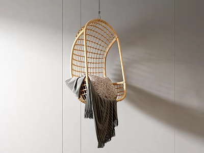 Cozy Rattan Hanging Chair with Soft Blanket and Woven Cushion Against Light Wall 3d model