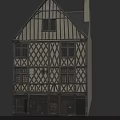 Traditional Timber Framed Historical City Building With Multiple Windows And Chimney Structure