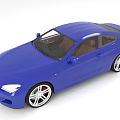 Modern Blue Two Door Sports Car With Sleek Design And Silver Wheels