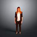Woman with red hair in black blazer white shirt dark pants sandals against gray background