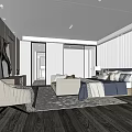 Modern Hotel Guest Room With Bed Sofa Wooden Flooring Table Lamps And Accent Rug