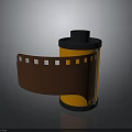 Vintage Household Film Reel With Black Lid Orange Body And Unfolded Brown Film Strip