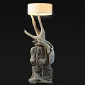 Natural Branch Design Floor Lamp With Carved Base And Light Colored Shade
