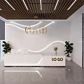 Modern Front Desk Reception Area With White Counter Logo Green Plants And Ceiling Lights