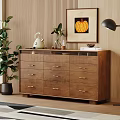 Wooden Dresser With Multiple Drawers Decorative Plants White Kettle And Pumpkin Painting In Living Room