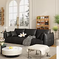 Black Sofa With White Round Coffee Table Pillows Blanket Beige Ottoman In Living Room