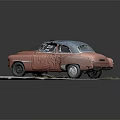 Old Rusty Red Classic Car With Damaged Roof On Broken Ground And Weeds