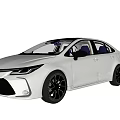 White Toyota Sedan With Modern Design Black Alloy Wheels And Tinted Windows