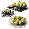 Fresh Pears Displayed in Transparent Glass Bowl and Black Bowl with Green Leaf