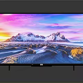 Modern High Definition TV Displaying Scenic Sunset Over Snowy Mountains With Colorful Sky
